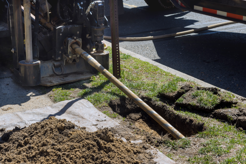 Commercial plumbers doing sewer repair