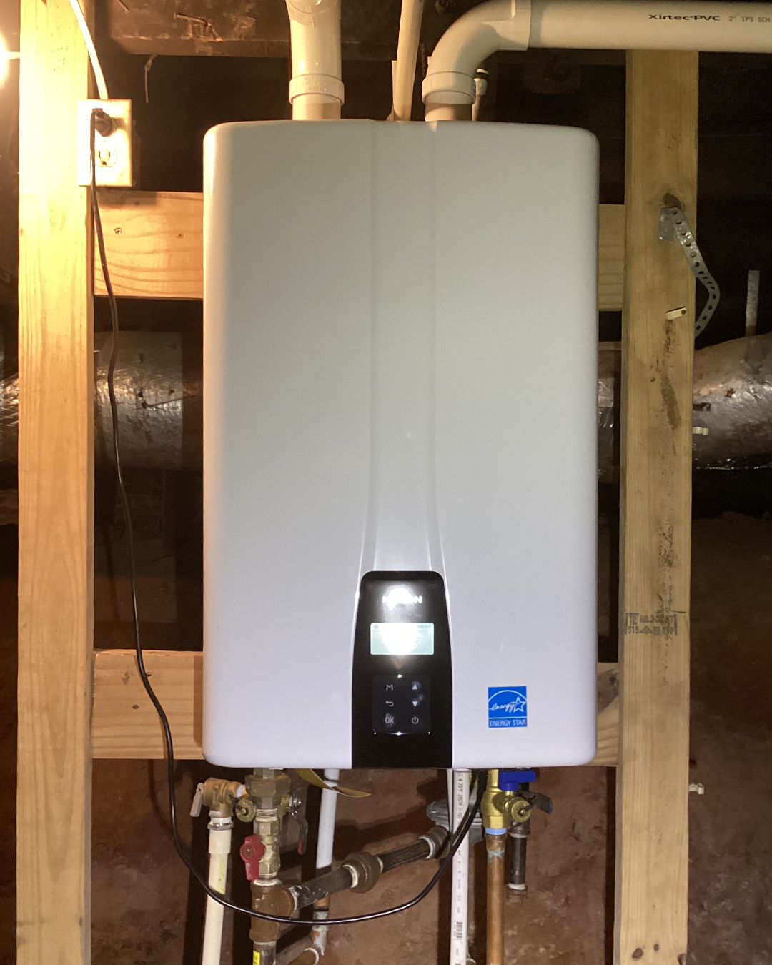 Navien tankless water heater installed at a Forest City NC commercial property by Ohmstead Plumbing